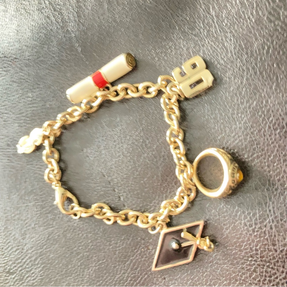 Gold Charm Bracelet with Red Accent